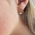 Gold stud earrings